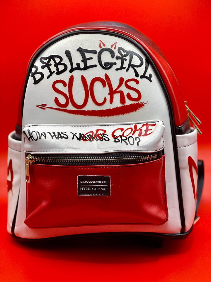 DQM X HYPER iCONiC. BibleGirl Sucks Mini Backpack - dragqueenmerch